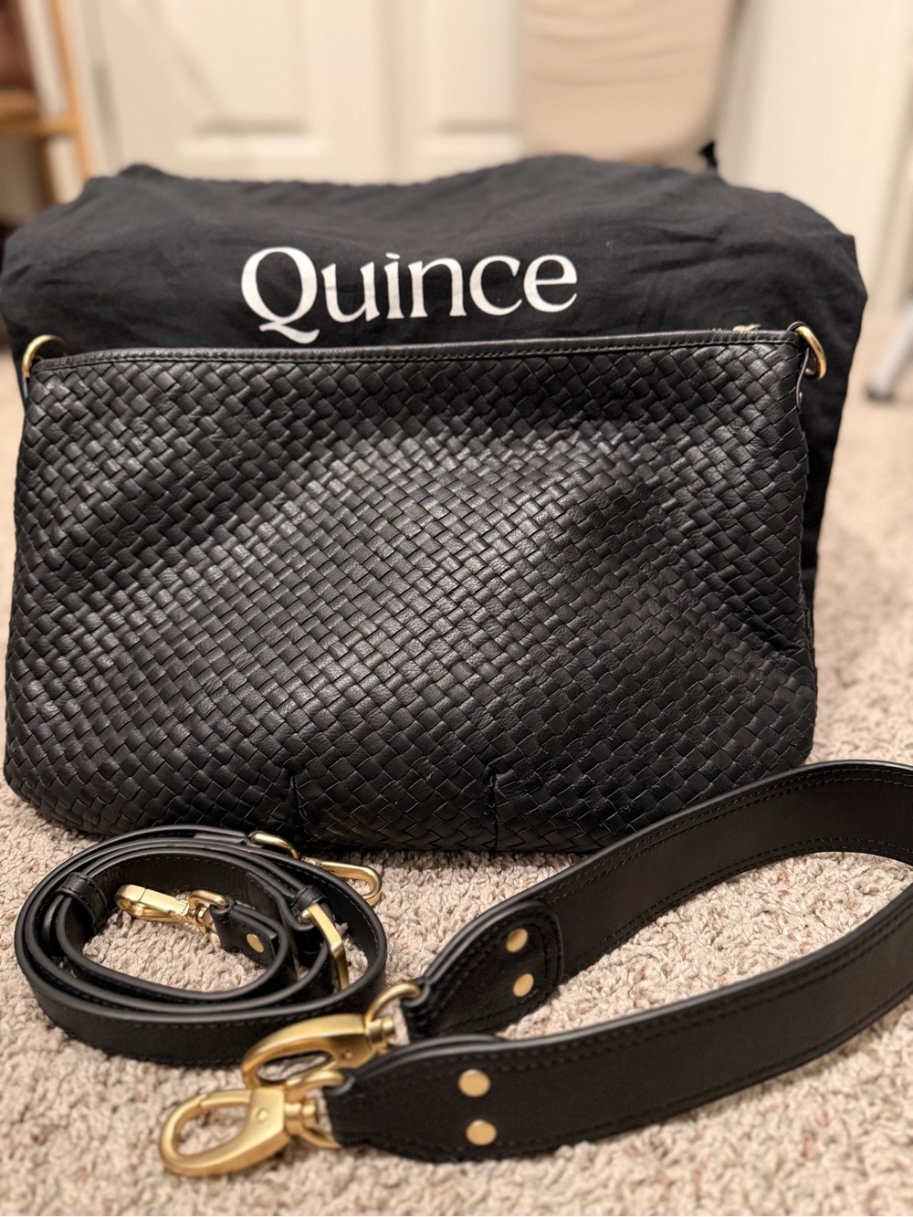 Quince Black Woven Leather Crossbody with Gold Hardware